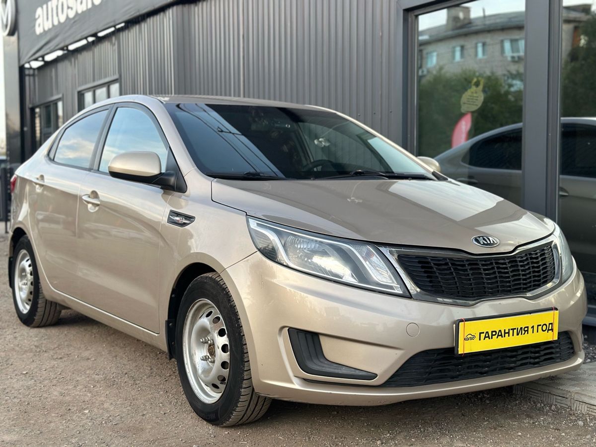 Kia Rio III 1.4 AT (107 л.с.) Comfort 2014 — фото 6