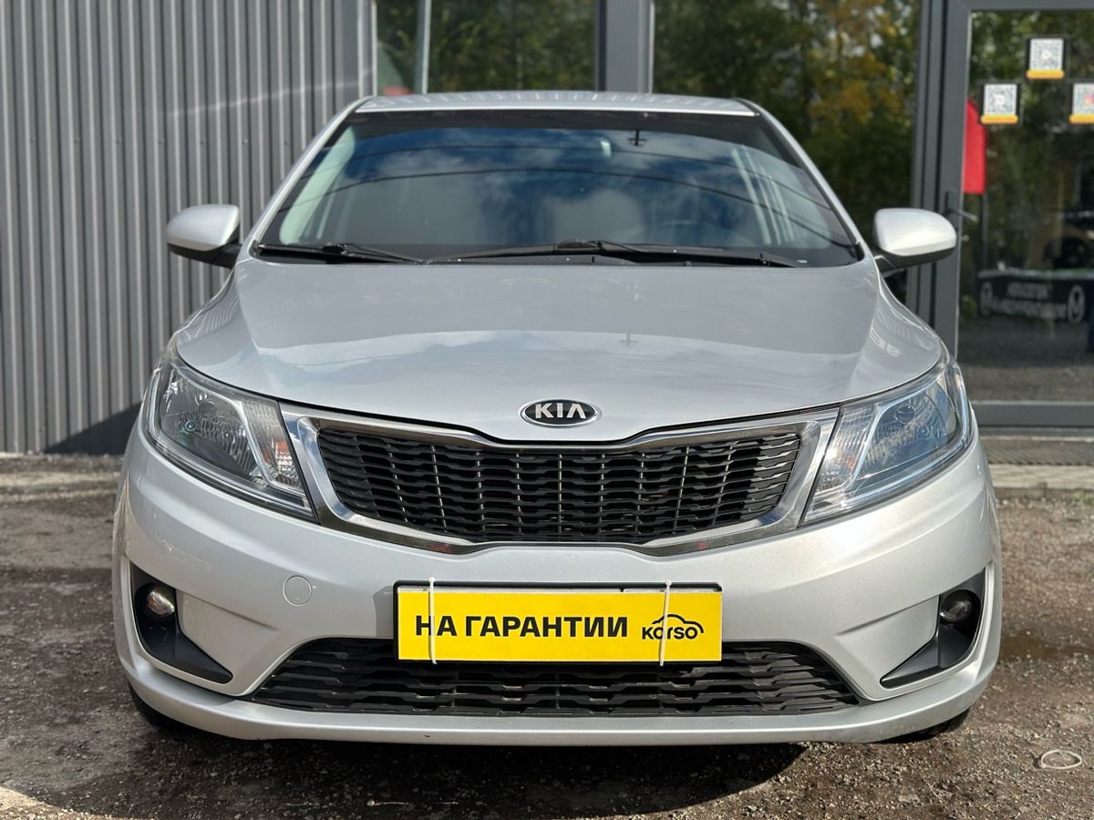 Kia Rio III 6-speed 1.6 MT (123 л.с.) Luxe 2014 — фото 2