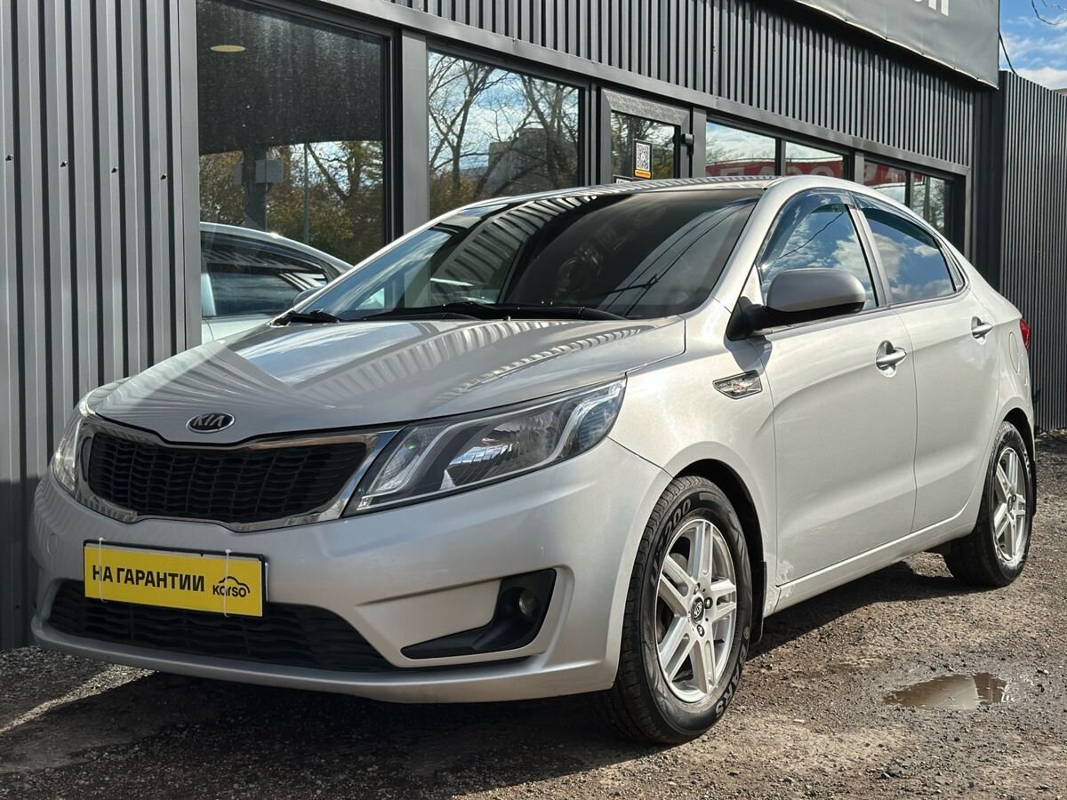 Kia Rio III 6-speed 1.6 MT (123 л.с.) Luxe 2014 — фото 9