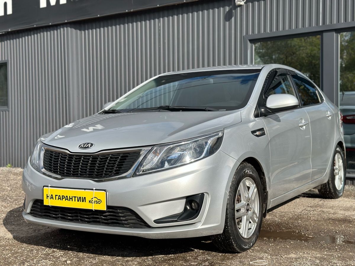 Kia Rio III 6-speed 1.6 MT (123 л.с.) Luxe 2014 — фото 3