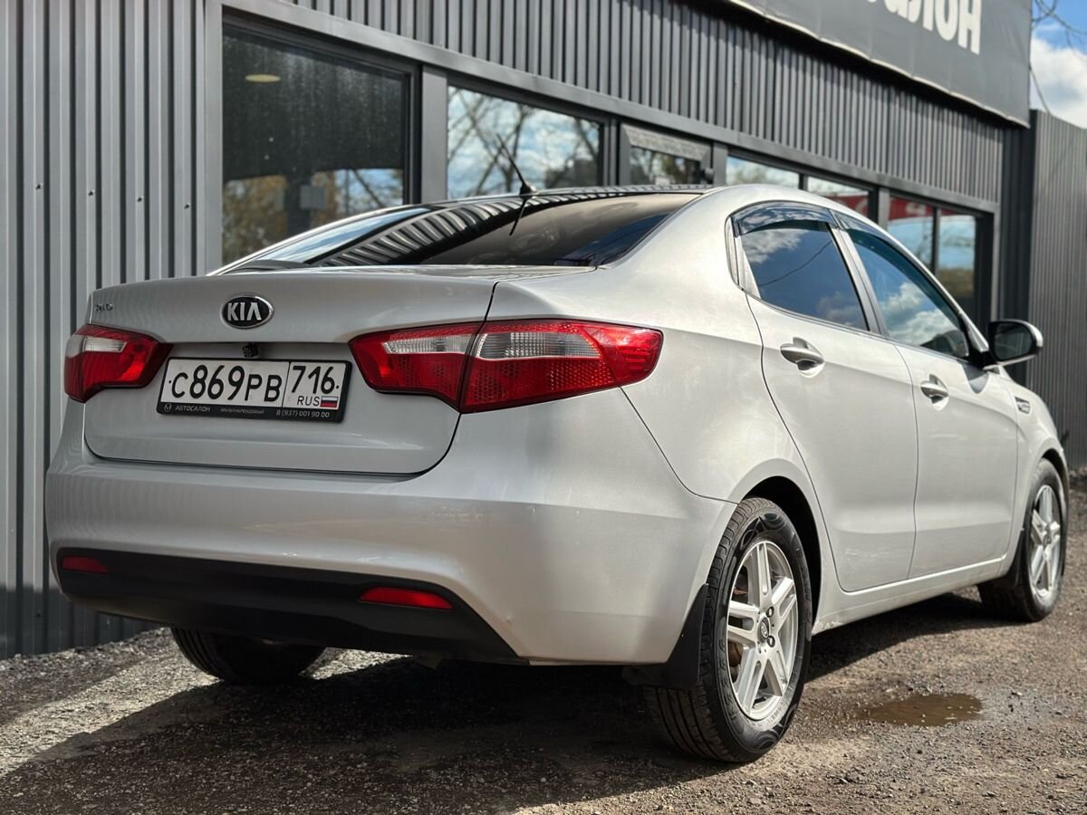 Kia Rio III 6-speed 1.6 MT (123 л.с.) Luxe 2014 — фото 7