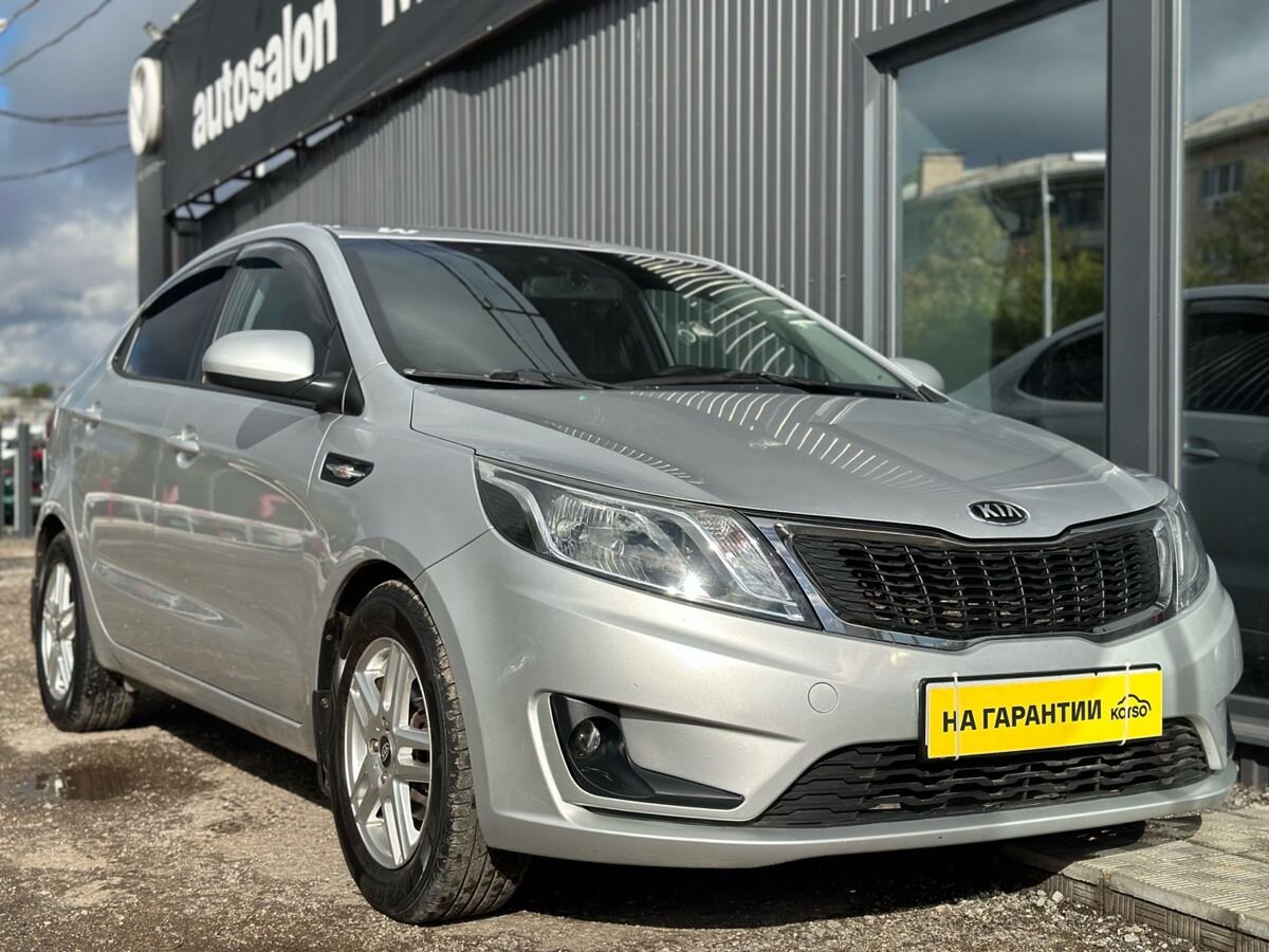 Kia Rio III 6-speed 1.6 MT (123 л.с.) Luxe 2014 — фото 6