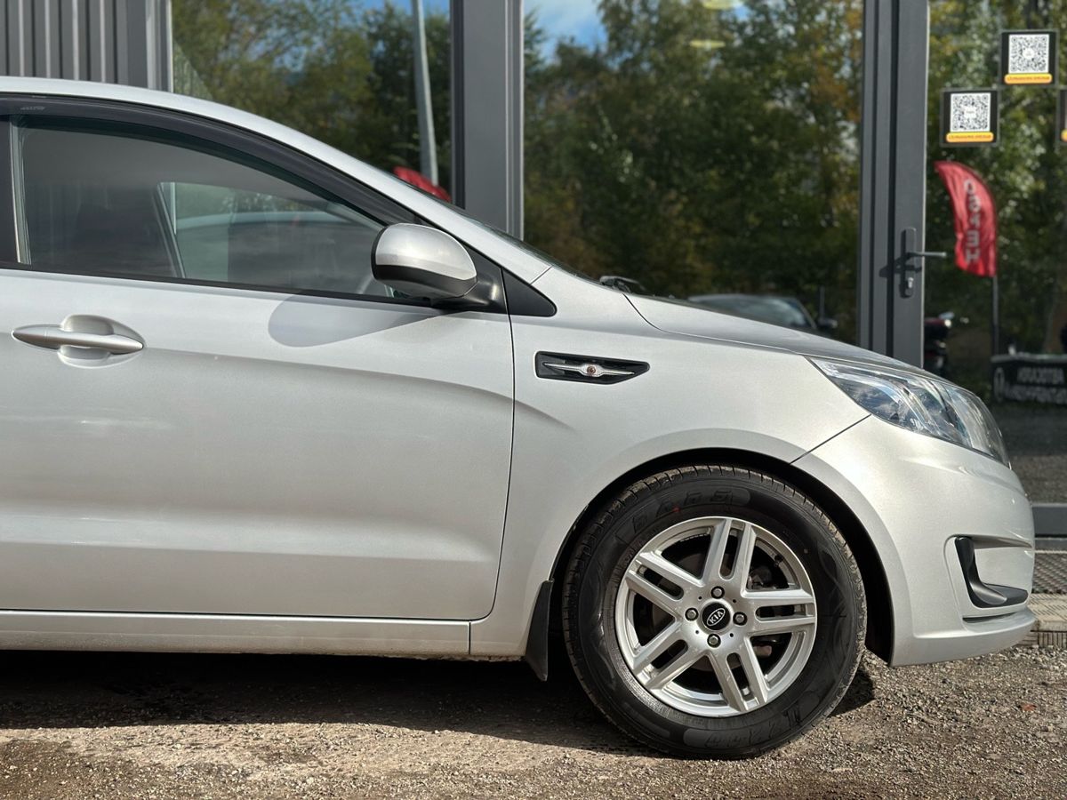 Kia Rio III 6-speed 1.6 MT (123 л.с.) Luxe 2014 — фото 4
