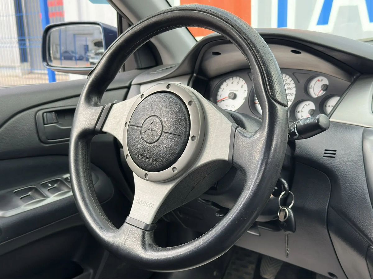 Mitsubishi Lancer — фото 9