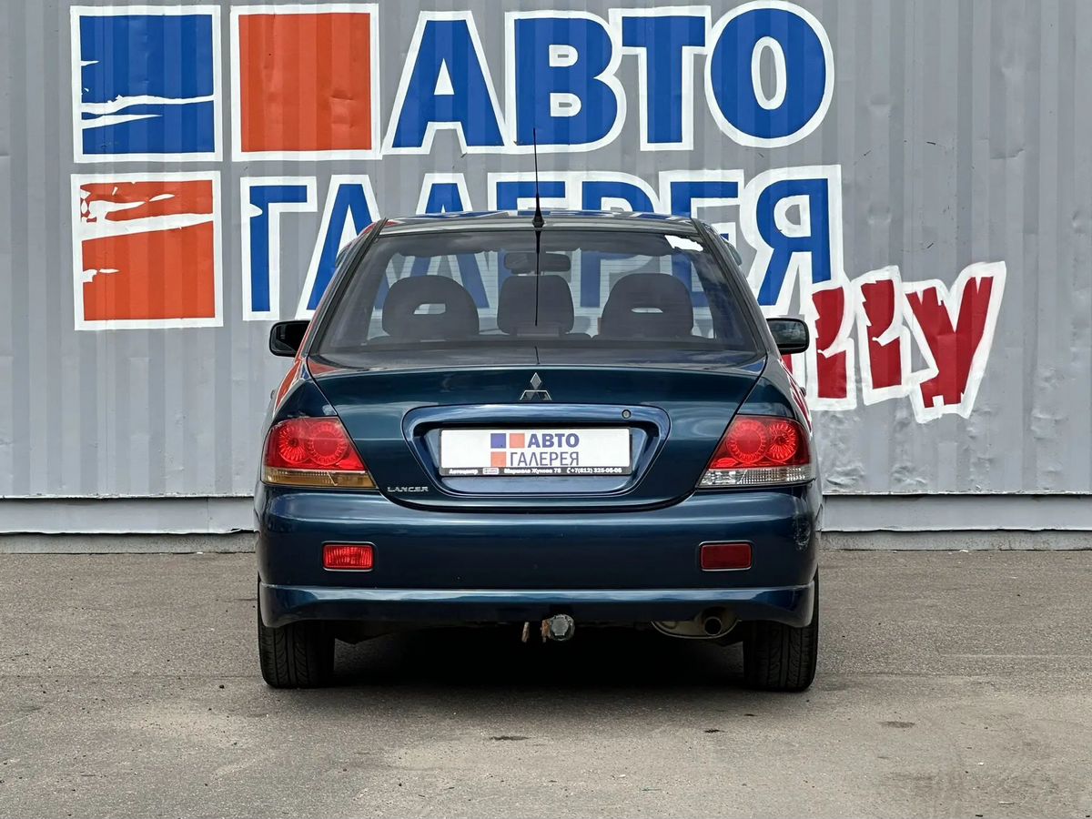 Mitsubishi Lancer — фото 4
