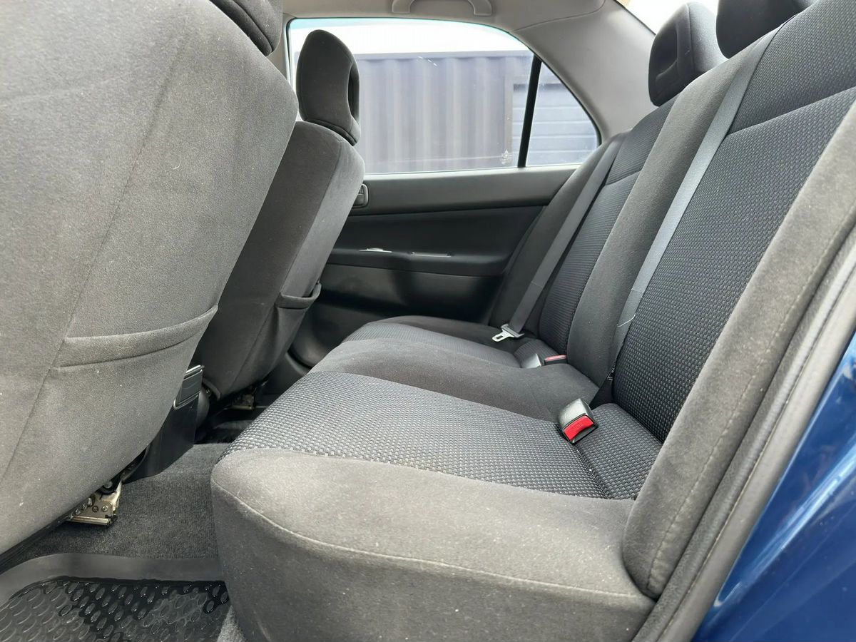 Mitsubishi Lancer — фото 7