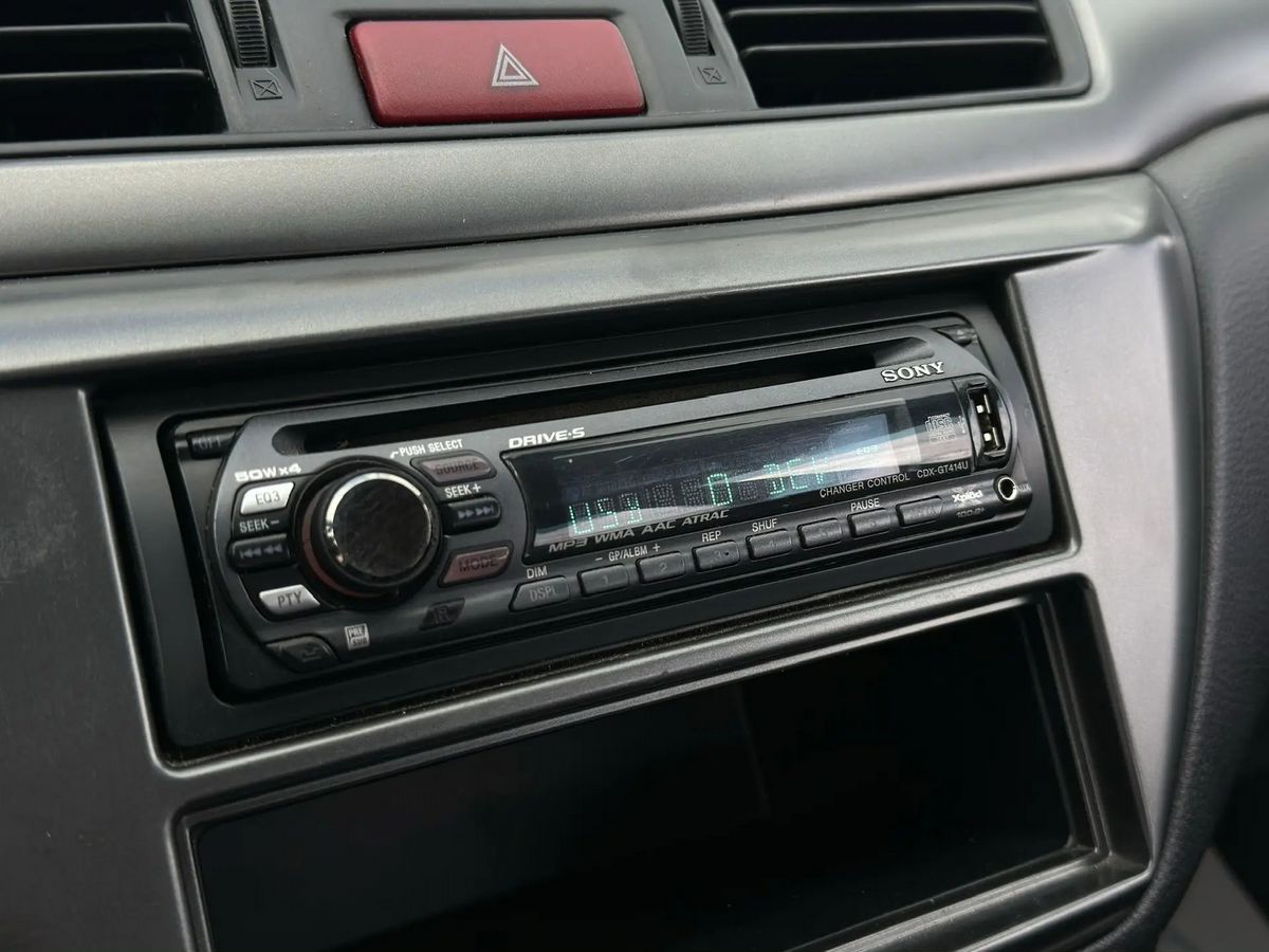 Mitsubishi Lancer — фото 12
