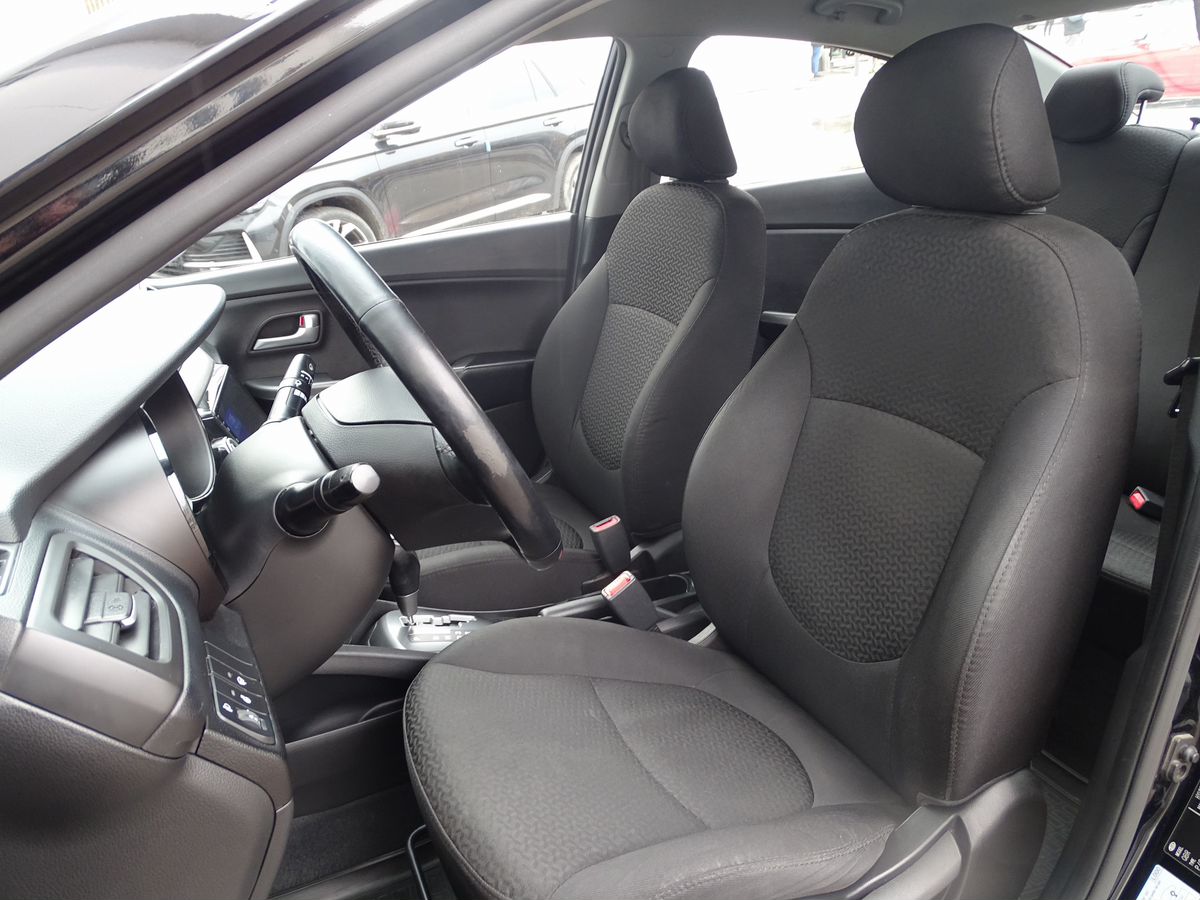 Автомобиль Kia Rio 1.4 AT (107 л.с.) - 5
