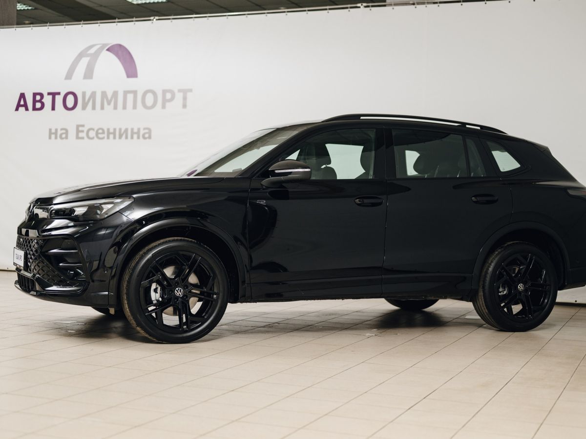 Volkswagen Tiguan - фото 1
