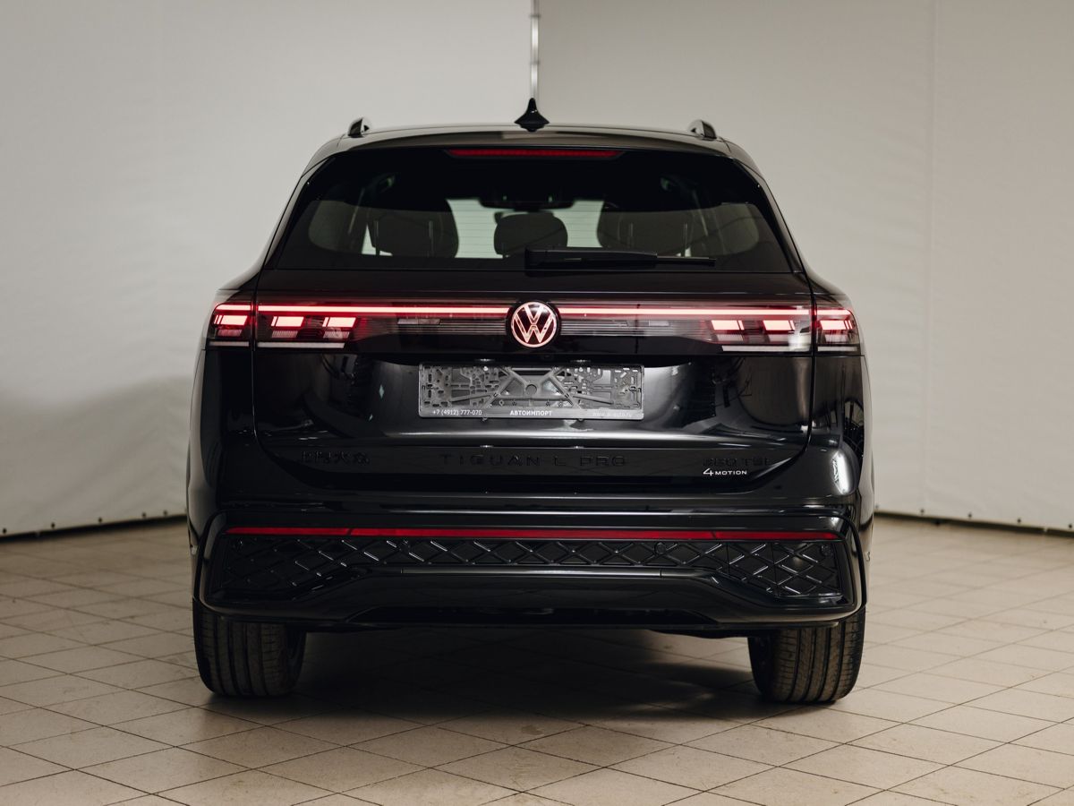 Volkswagen Tiguan - фото 5