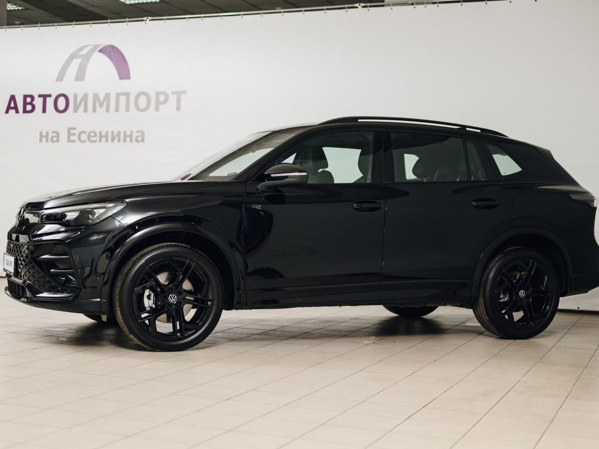 Volkswagen Tiguan - фото 1