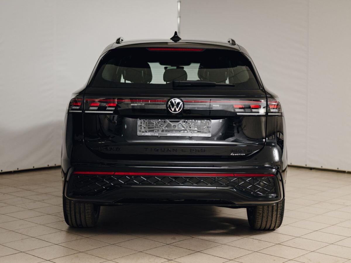 Volkswagen Tiguan - фото 6