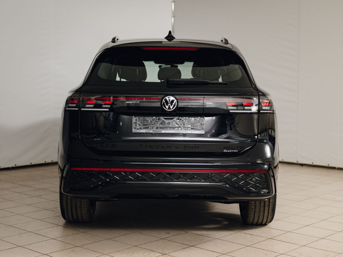 Volkswagen Tiguan - фото 9