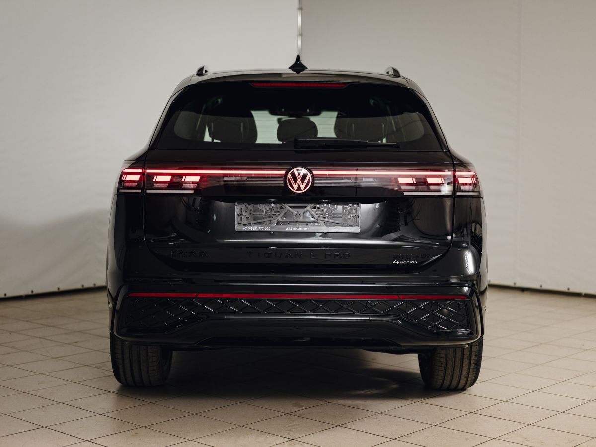 Volkswagen Tiguan - фото 8