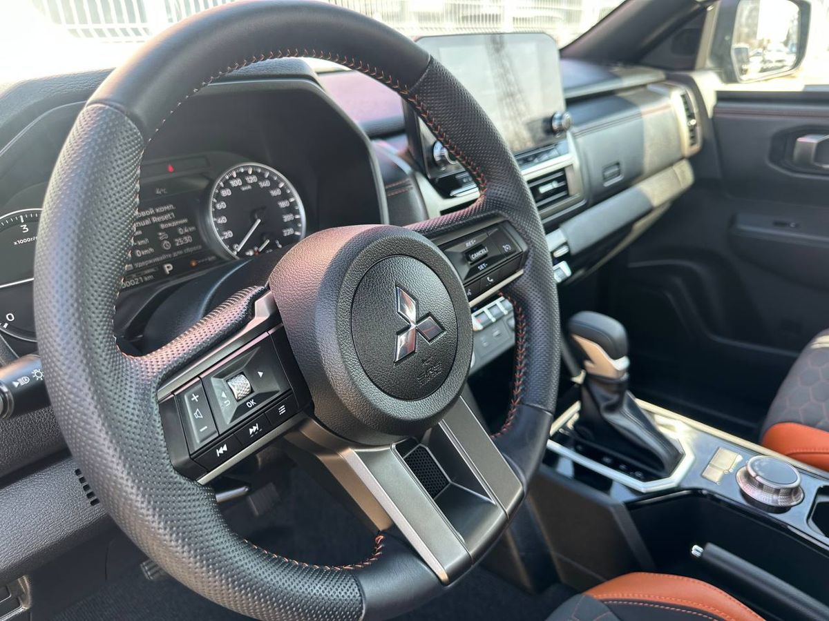 Mitsubishi L200 - фото 13