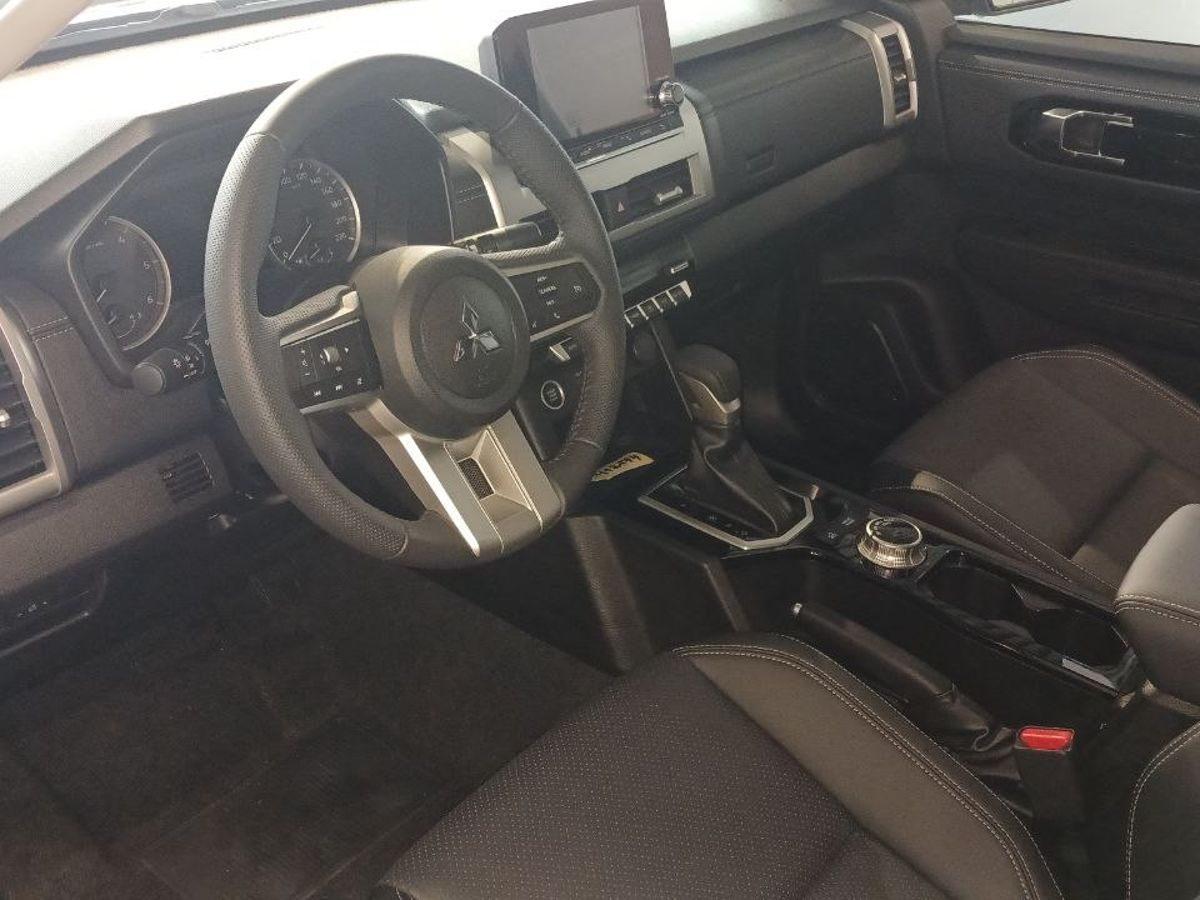 Mitsubishi L200 - фото 11