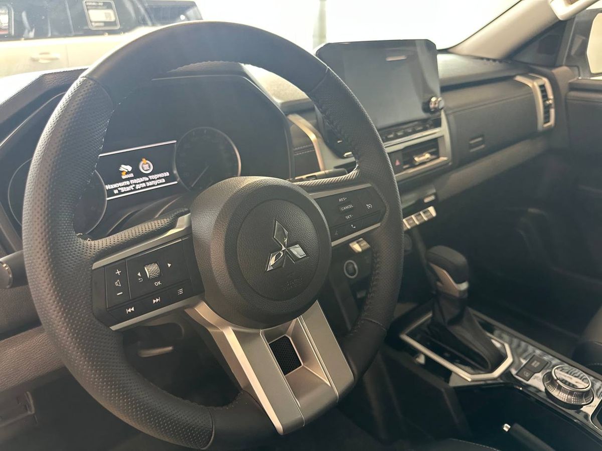 Mitsubishi L200 - фото 11