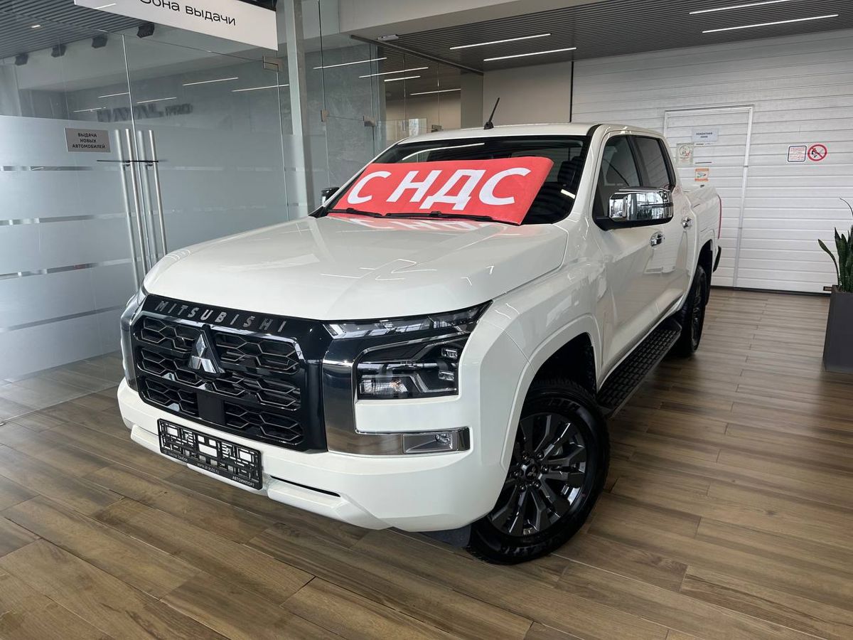 Mitsubishi L200 - фото 1