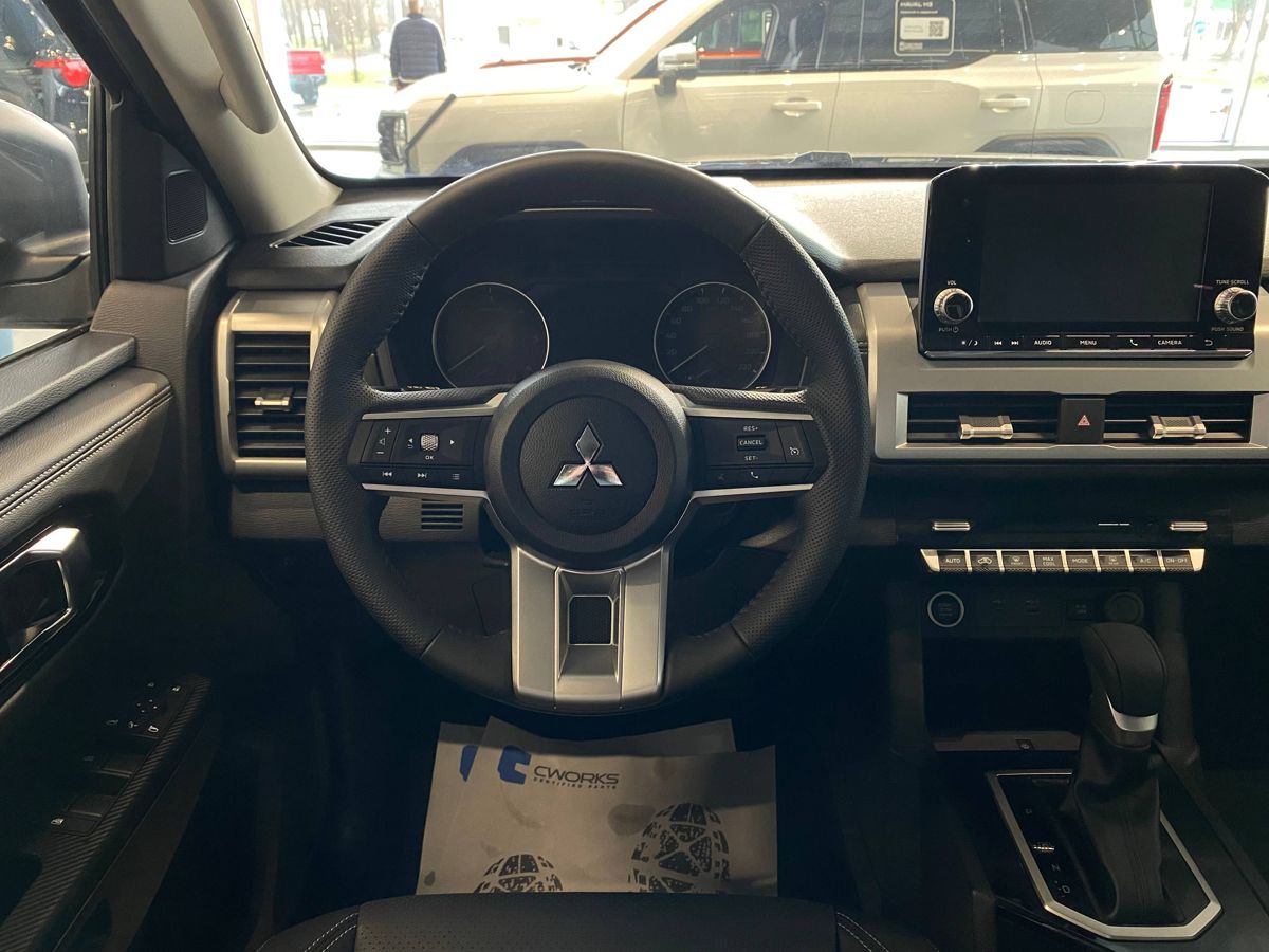 Mitsubishi L200 - фото 13